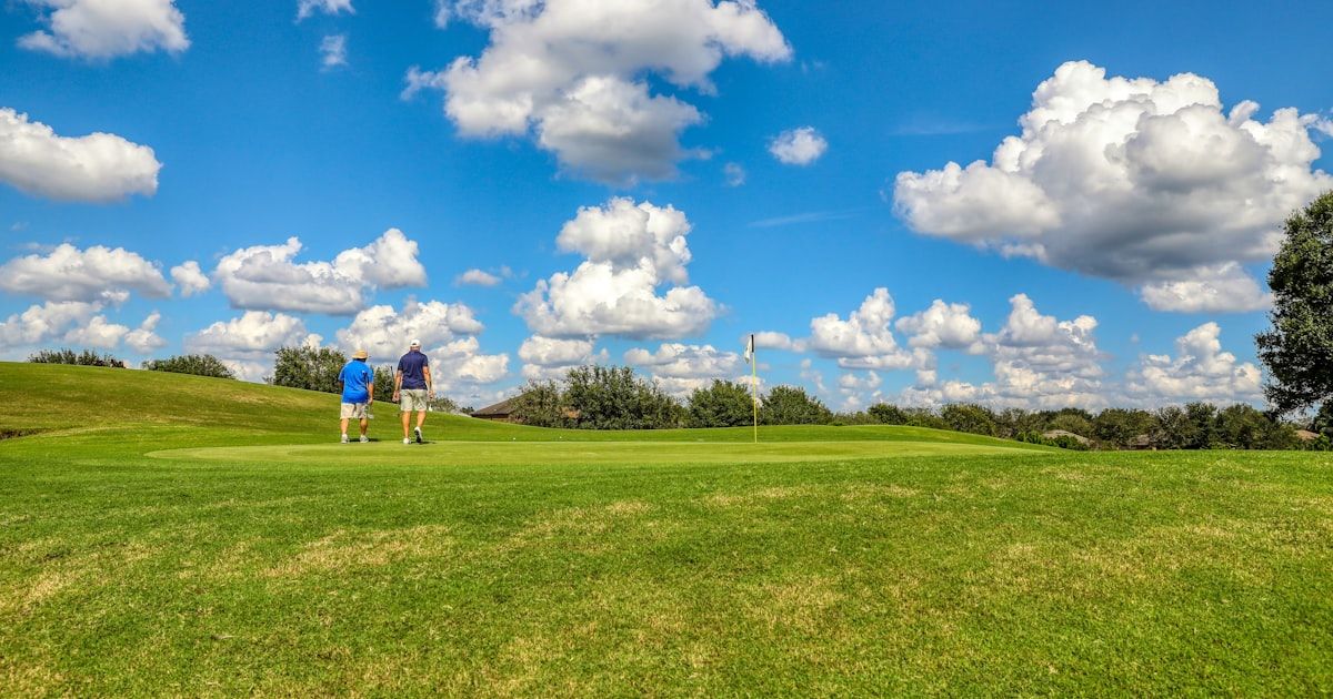 Golf-specific training facility with performance equipment and open floor space